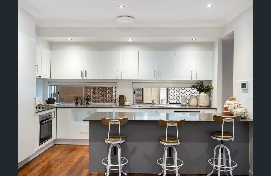 Kitchen island with refinished cabinetry