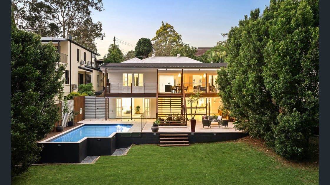 Residential exterior with poolside entertaining area