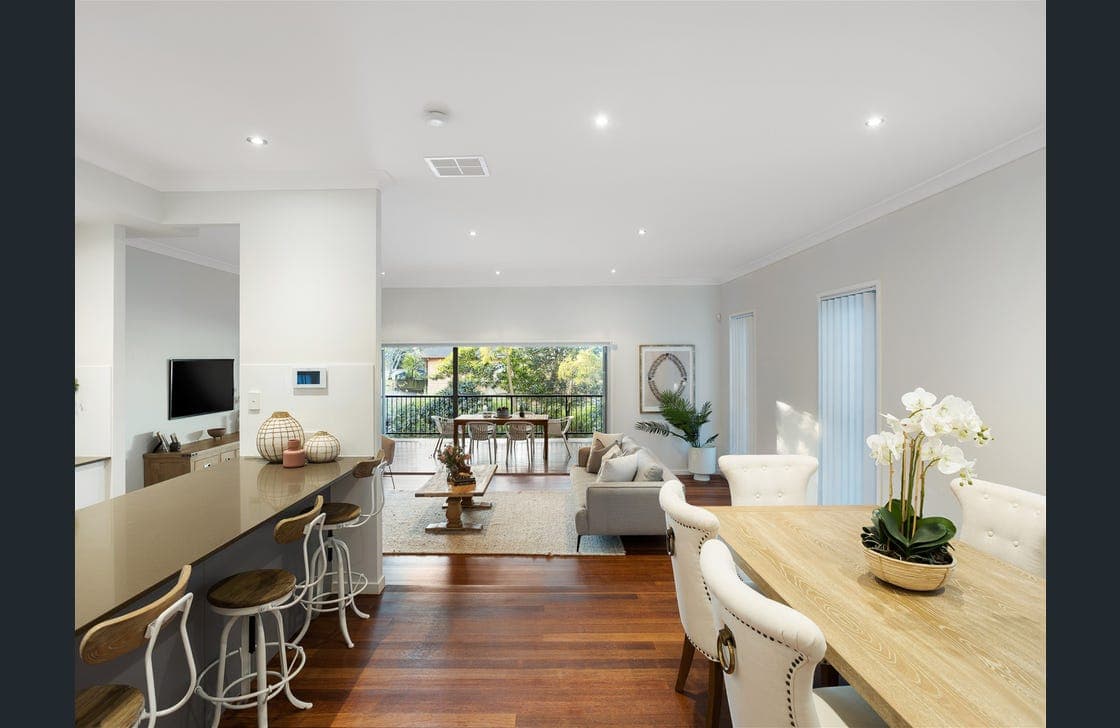 Open-plan kitchen and dining area repainted by Smart Quality Painting in Brisbane